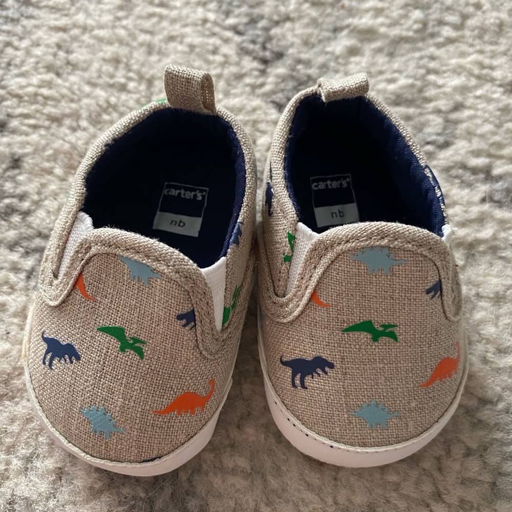 Carter’s Newborn Dinosaur shoes.